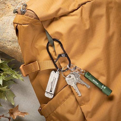edc carabiner holding keys, multitool and flashlight
