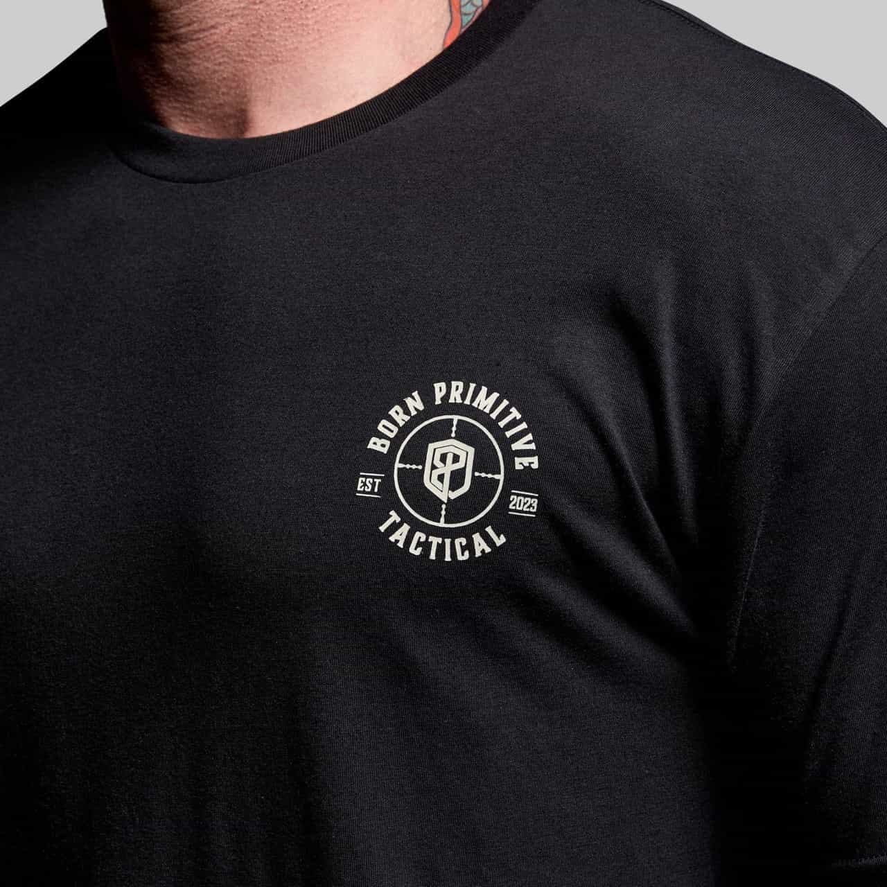 Black t-shirt with 'Born Primitive Tactical' logo on a gray background