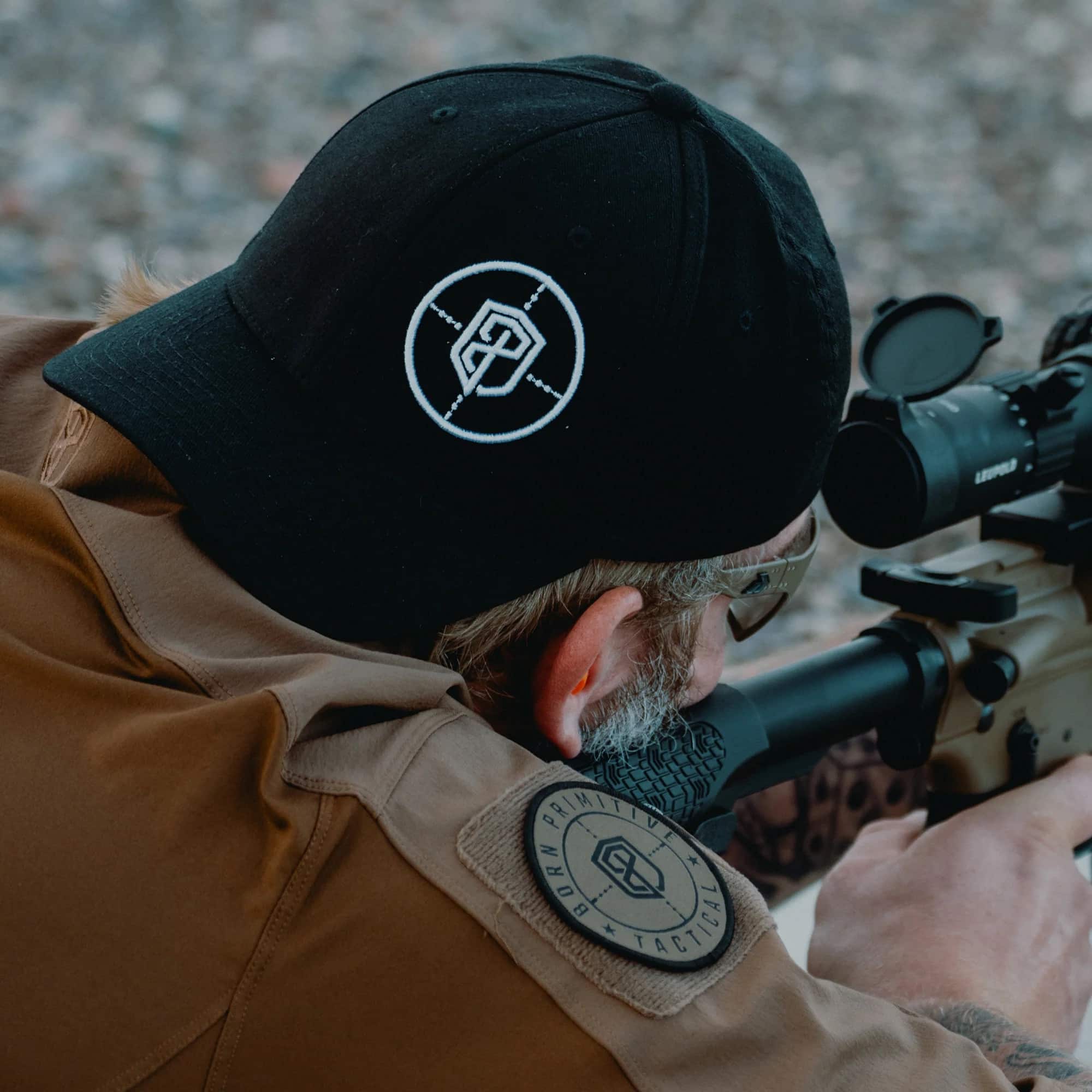 Born Primitive Tactical FlexFit Hat man wearing