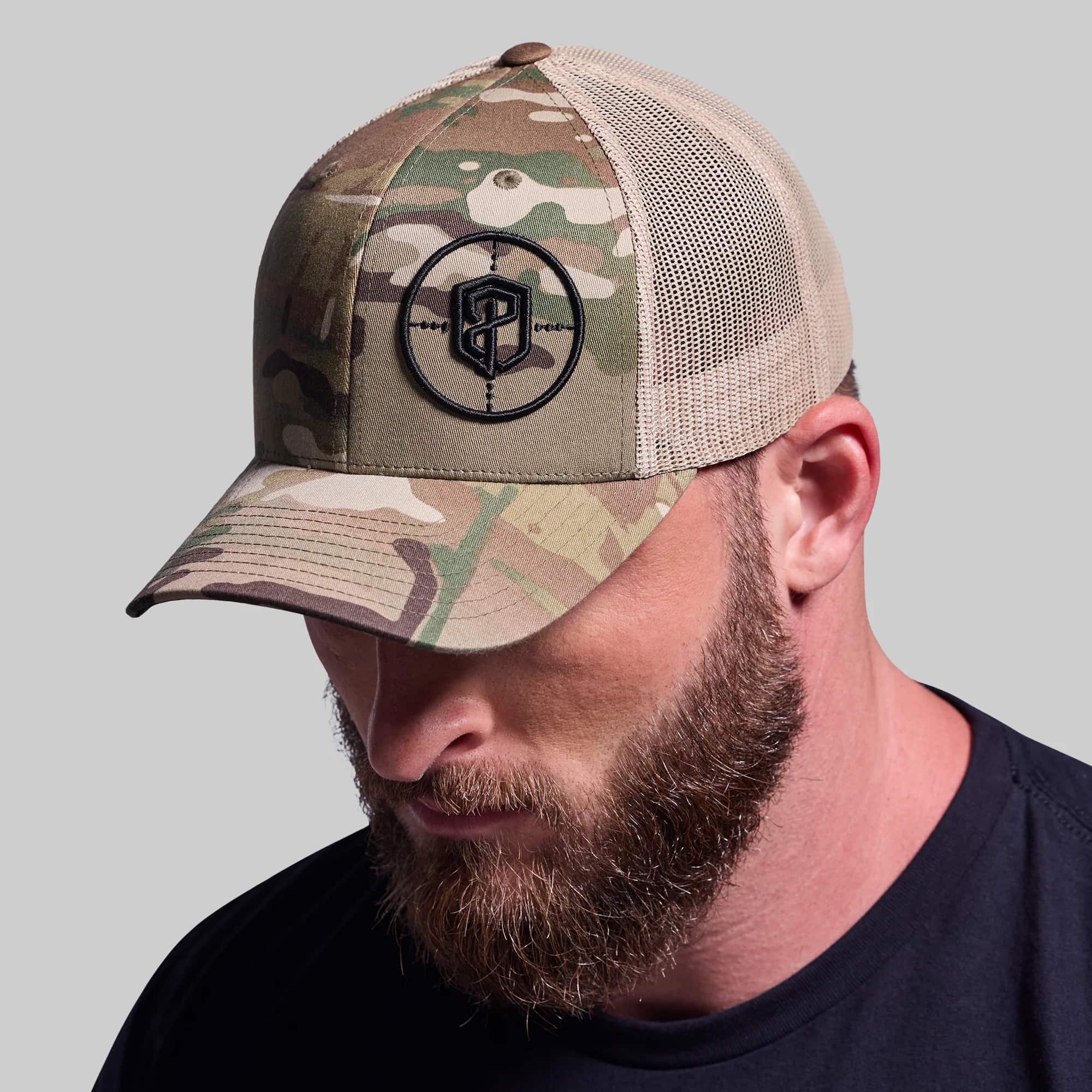 Born Primitive Tactical Trucker Hat man wearing multicam