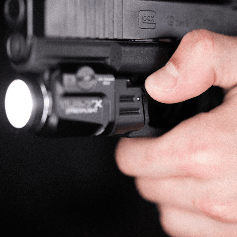 Kolibri Works ČVIRIQ - Streamlight TLR-7 Switch Buttons in hand