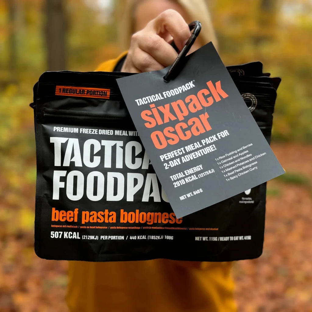 Tactical Foodpack meal kit with 'Sixpack Oscar' label against a blurred autumn background