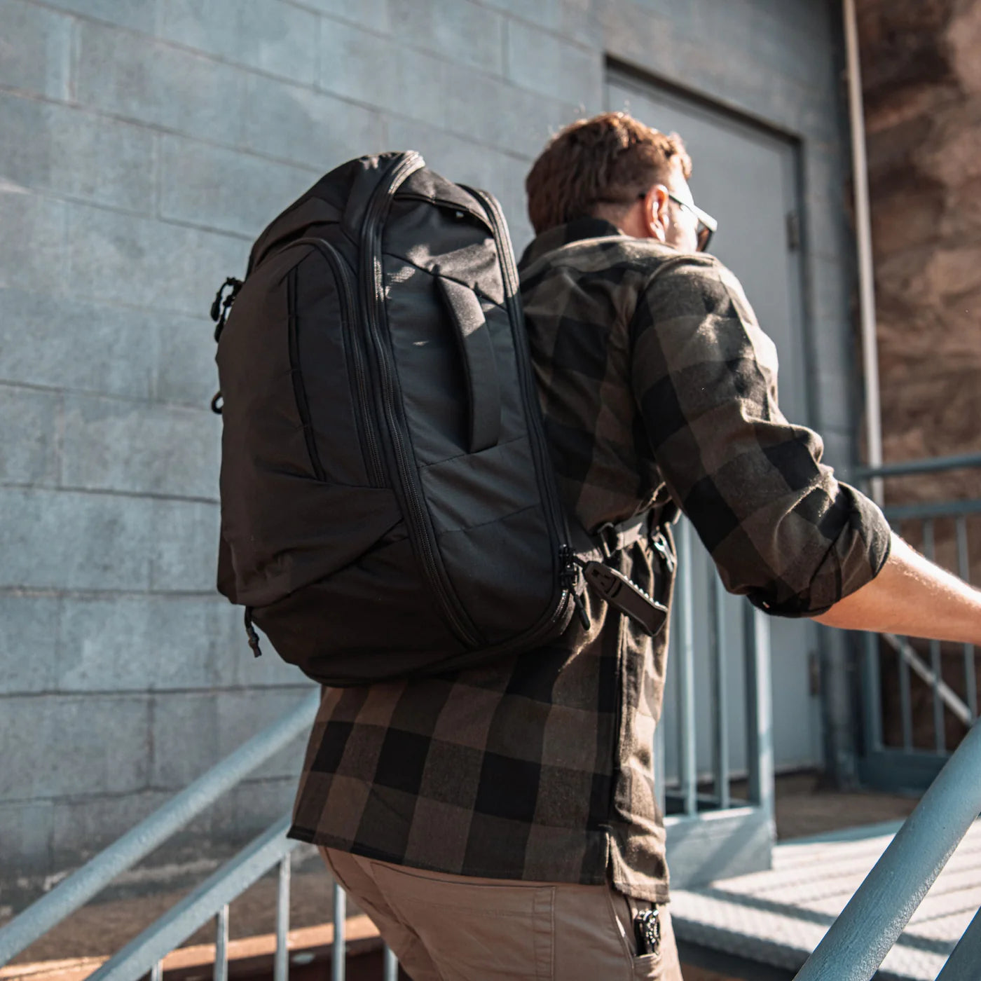 Vertx Gamut 22L Sling Bag walking
