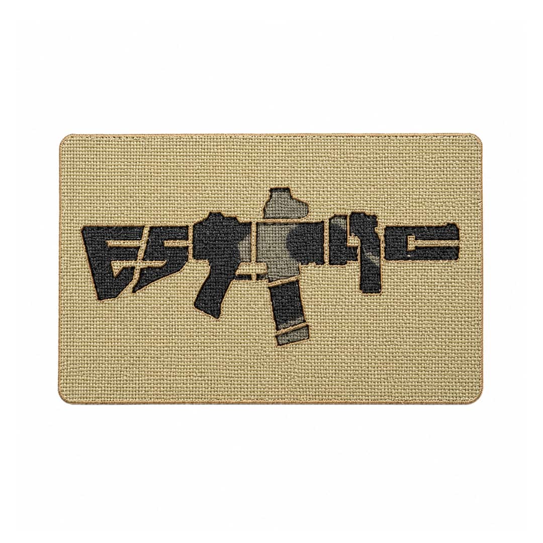 Tactical patch with a rifle and ESTTAC text on a beige background