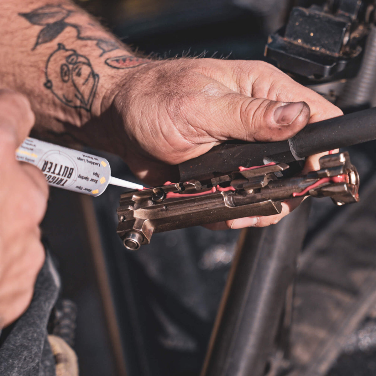 Gun Butter Trigger Grease applied during firearm maintenance