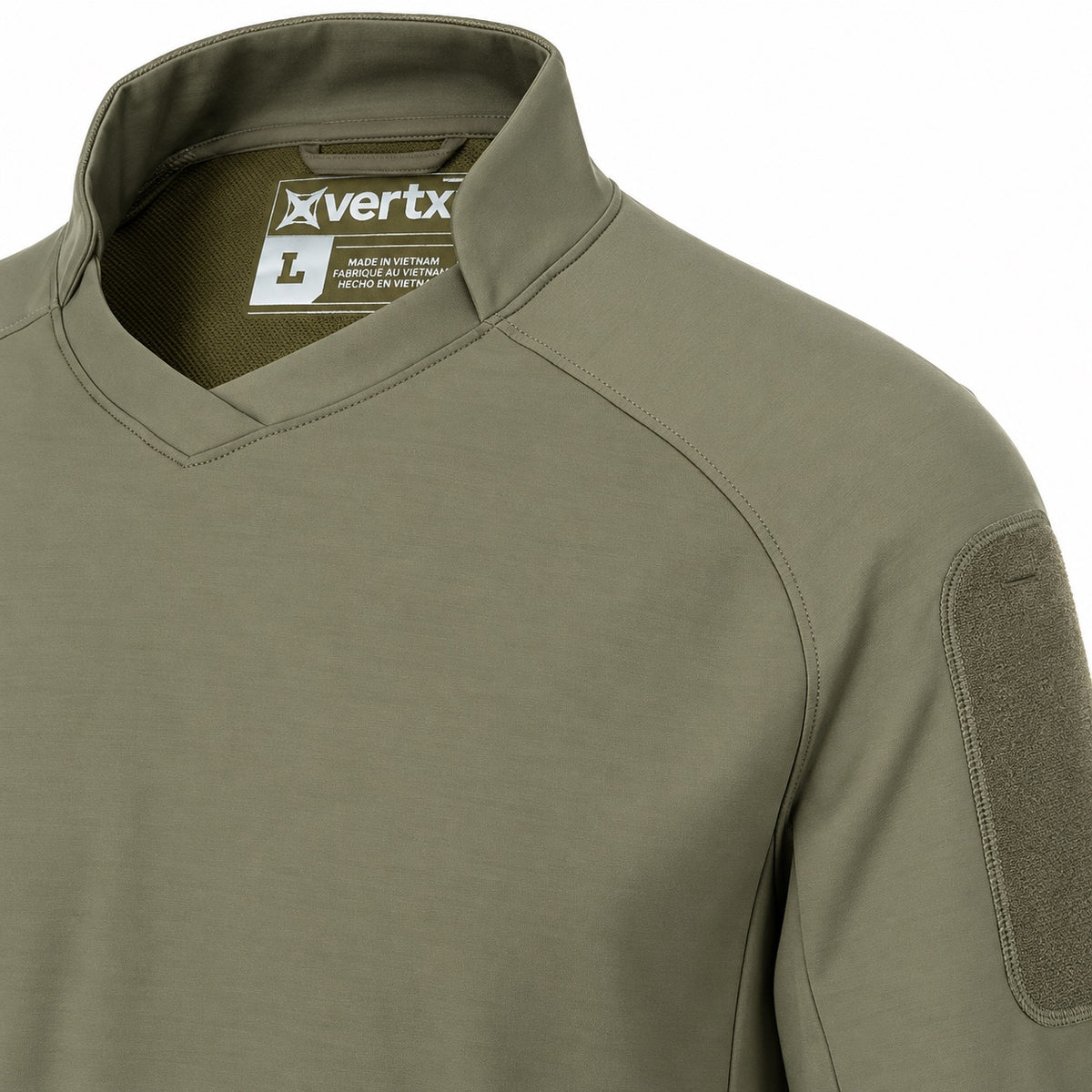 Vertx Enduro Training Long Sleeve Shirt in Ranger Green, close-up of collar, V-neck and sleeve patch panel on white background