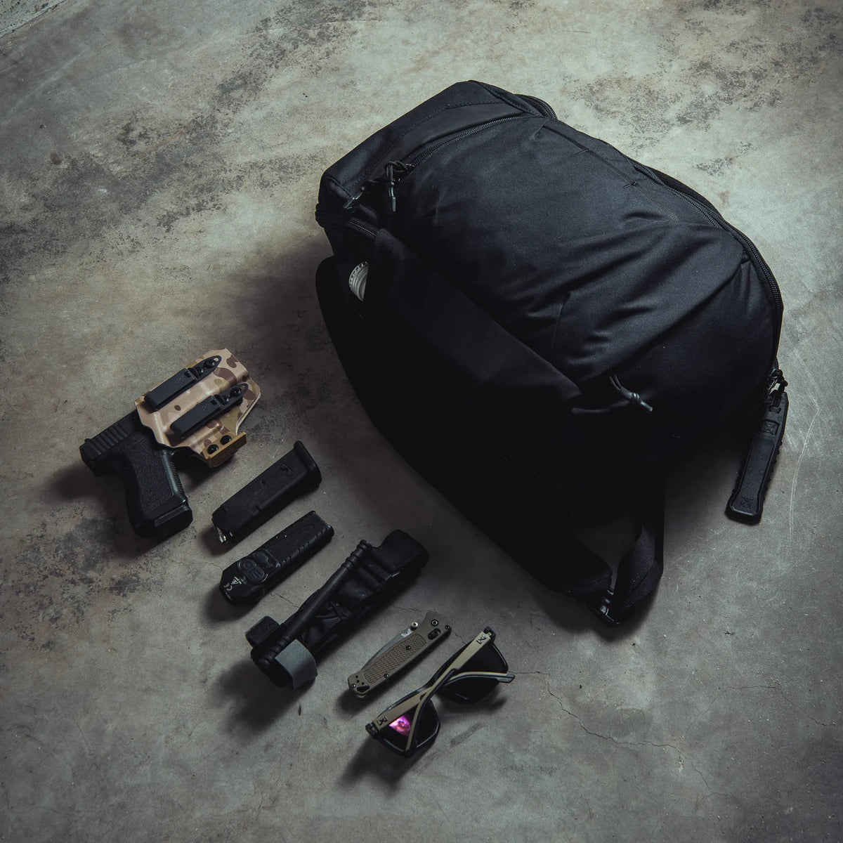 Vertx Gamut 18L Sling Bag pistol holster setup