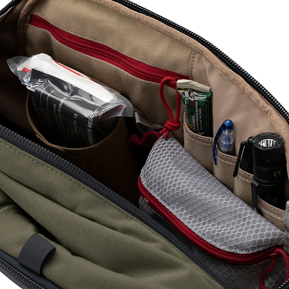 Vertx Small Overflow Mesh Pouch attached inside a Vertx bag for EDC organization