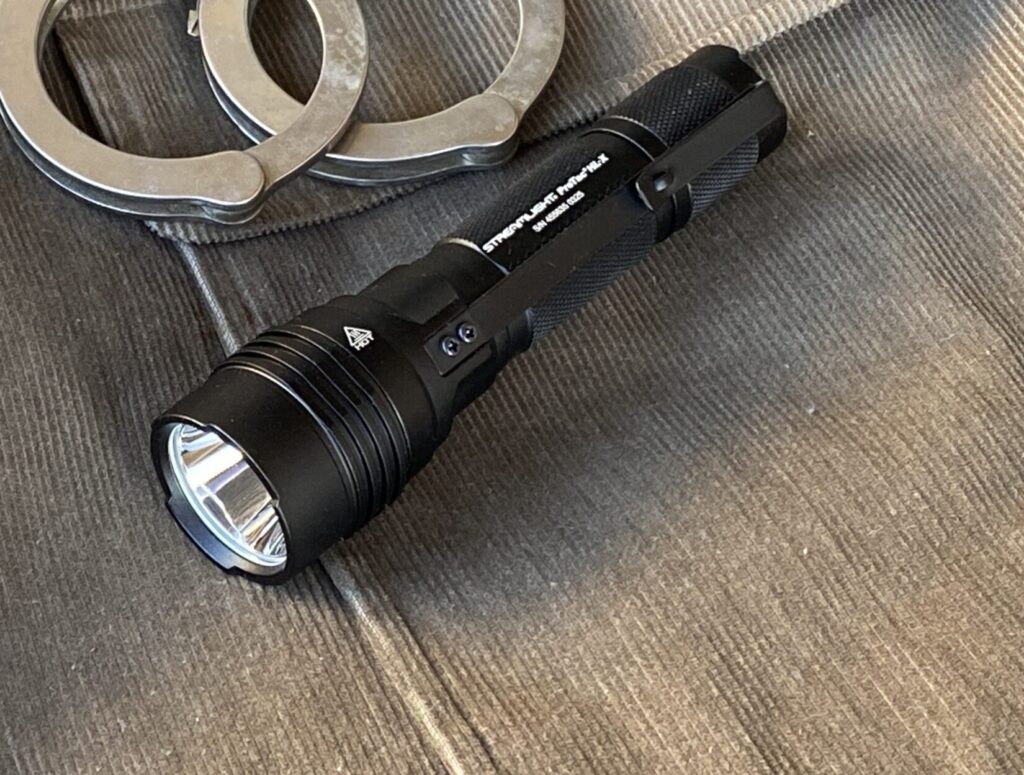 Tactical flashlight on a table