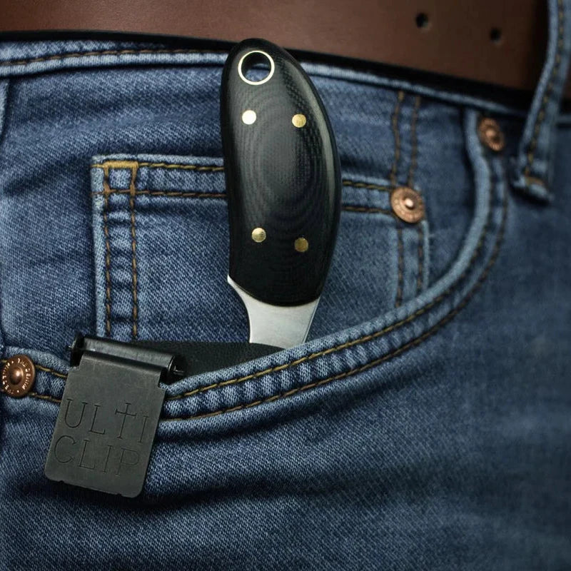 Black pocket knife with Ulticlip 3+ Attachment Clip close up