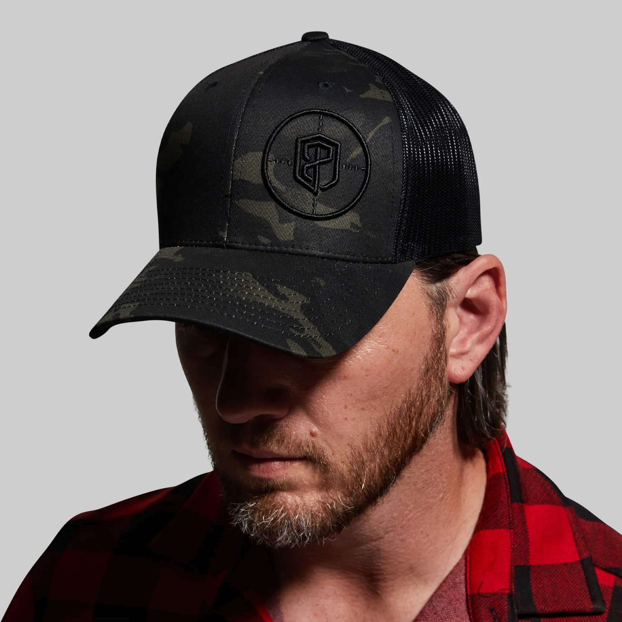 Born Primitive Tactical Trucker Hat man wearing