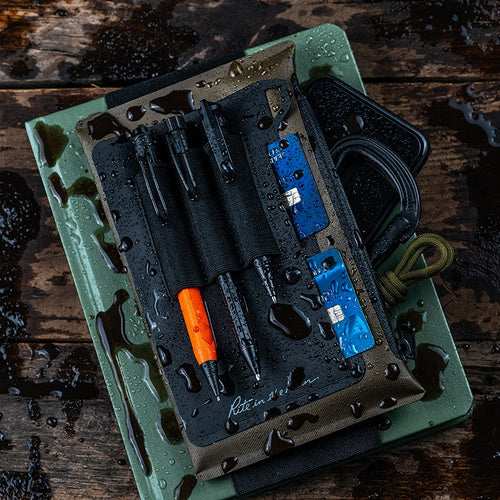 Rite in the Rain Dirtbag Pouch Organizer with items inside like pens, credit cards and cell phone
