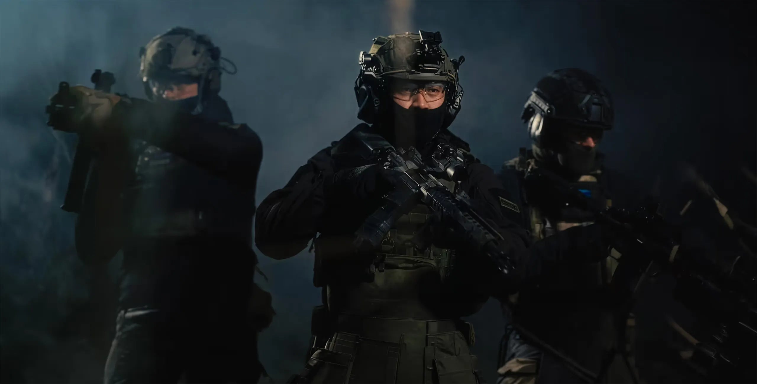 three men in tactical gear, combat situation