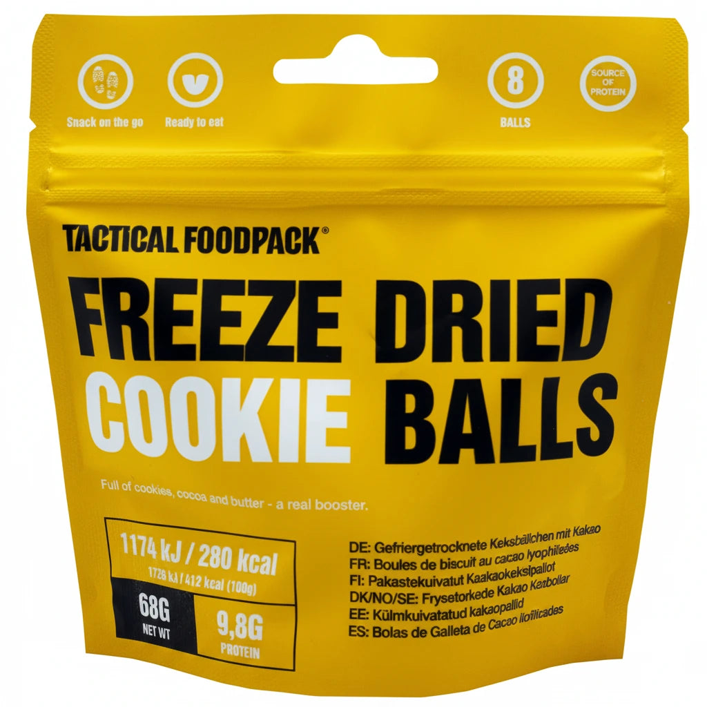 Yellow package of Tactical Foodpack freeze-dried cookie balls with text and icons.