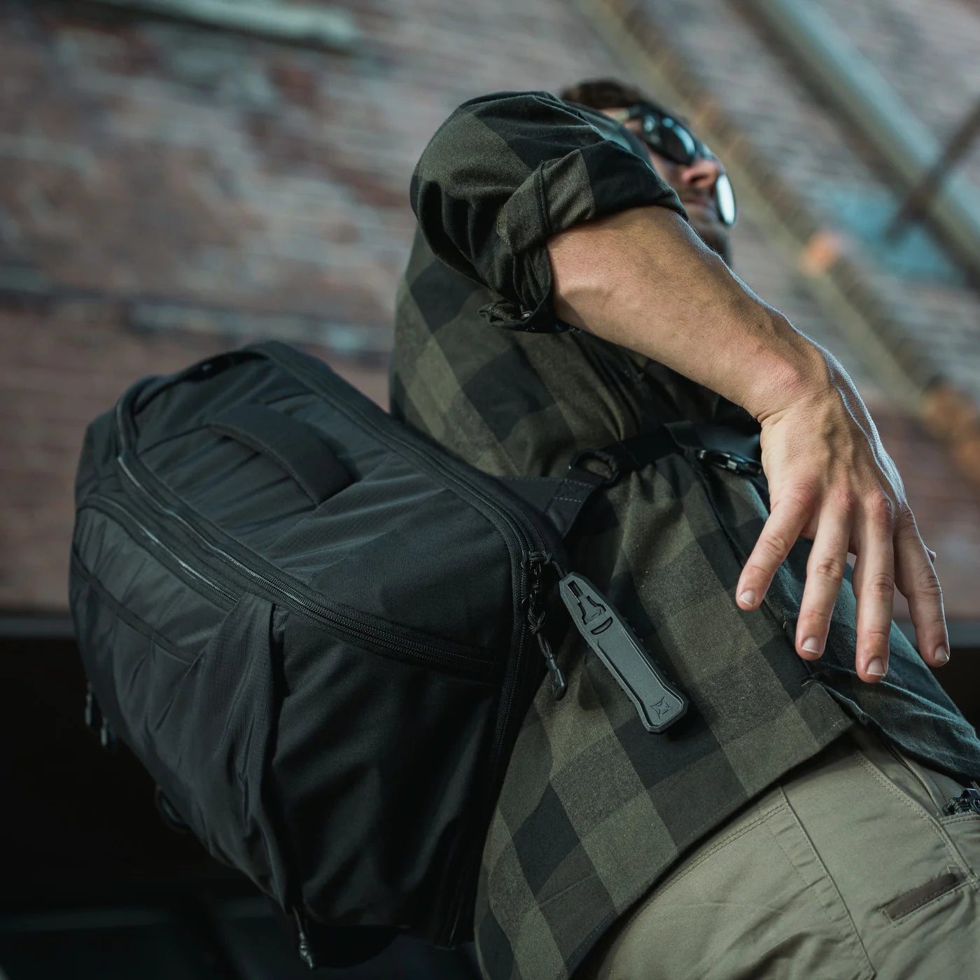 Vertx Gamut 18L Sling Bag in the street