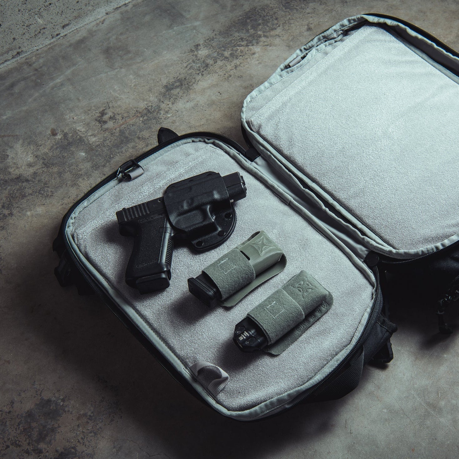 Vertx Gamut 18L Sling Bag pistol