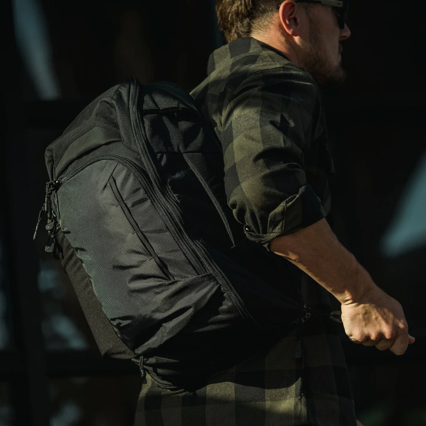 Vertx Gamut 22L Sling Bag in the streets