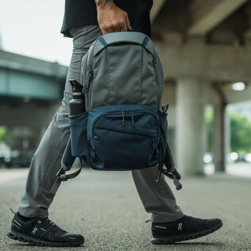 Vertx Ready Pack X Backpack in hand