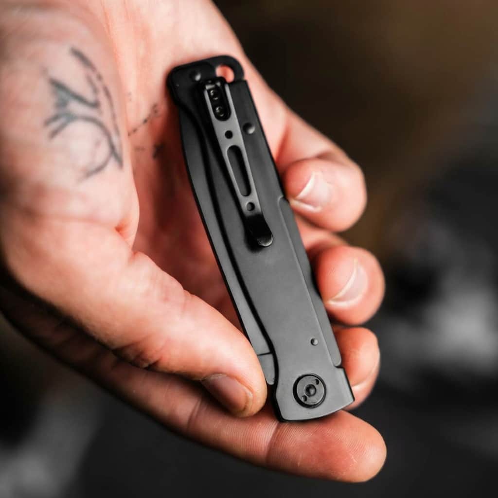 Böker Plus Atlas All Black folding knife in hand