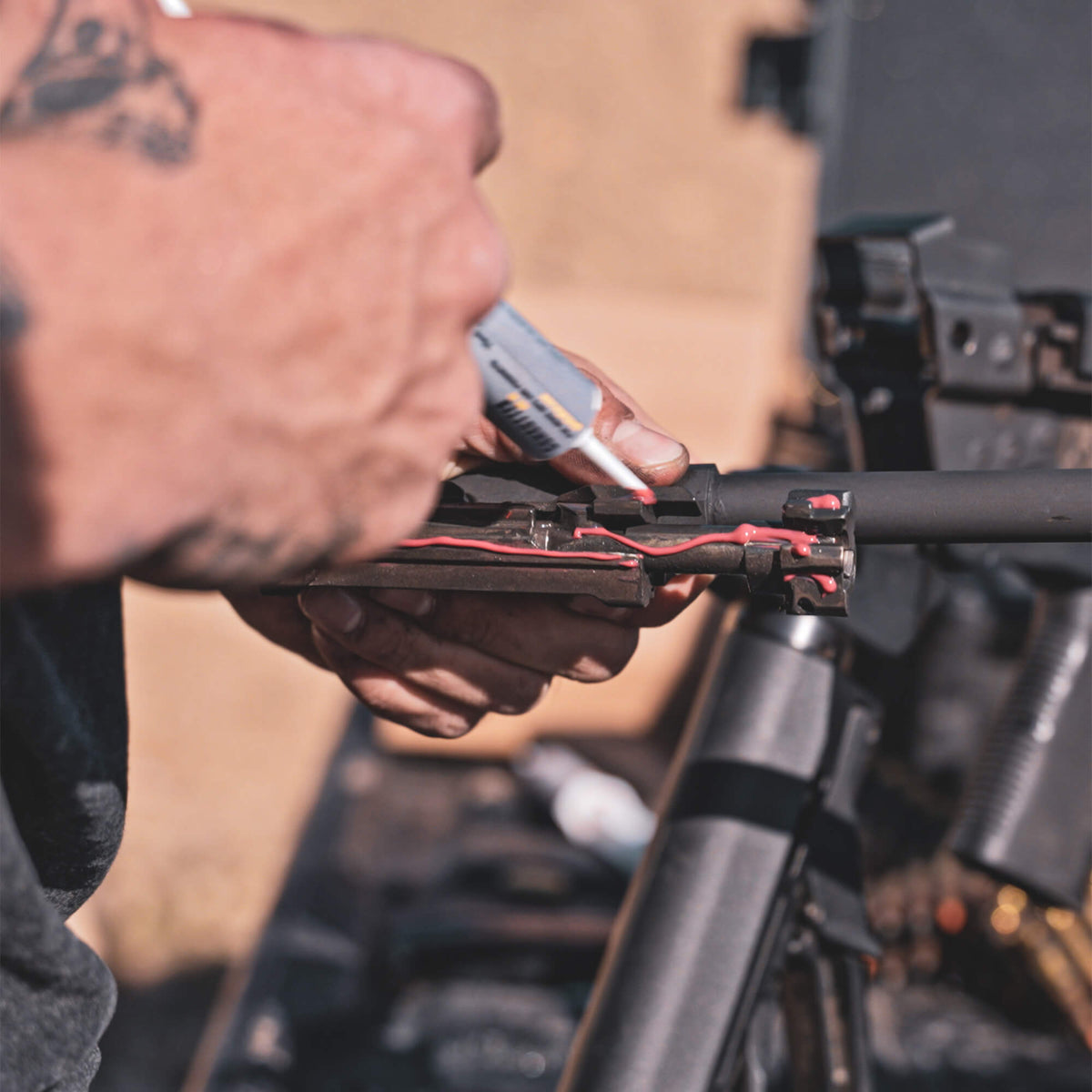 Gun Butter Trigger Grease precision applicator in use