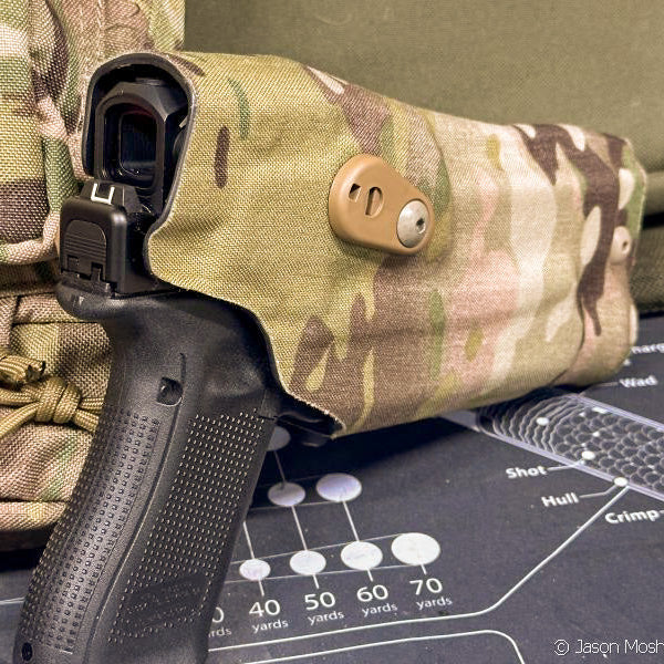 Safariland 6354RDSO ALS holster in Multicam shown in use on tactical gear