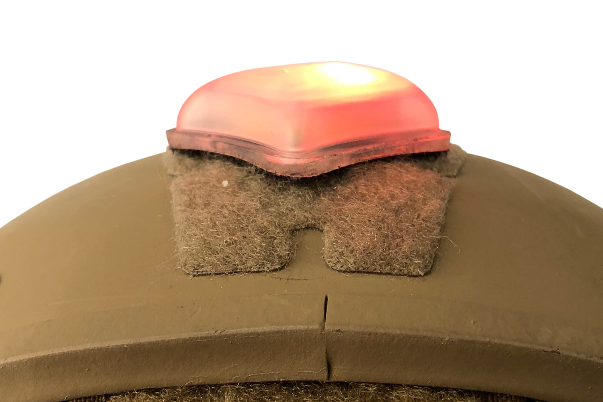 Unity Tactical SPARK Marker Light mounted on helmet view 1