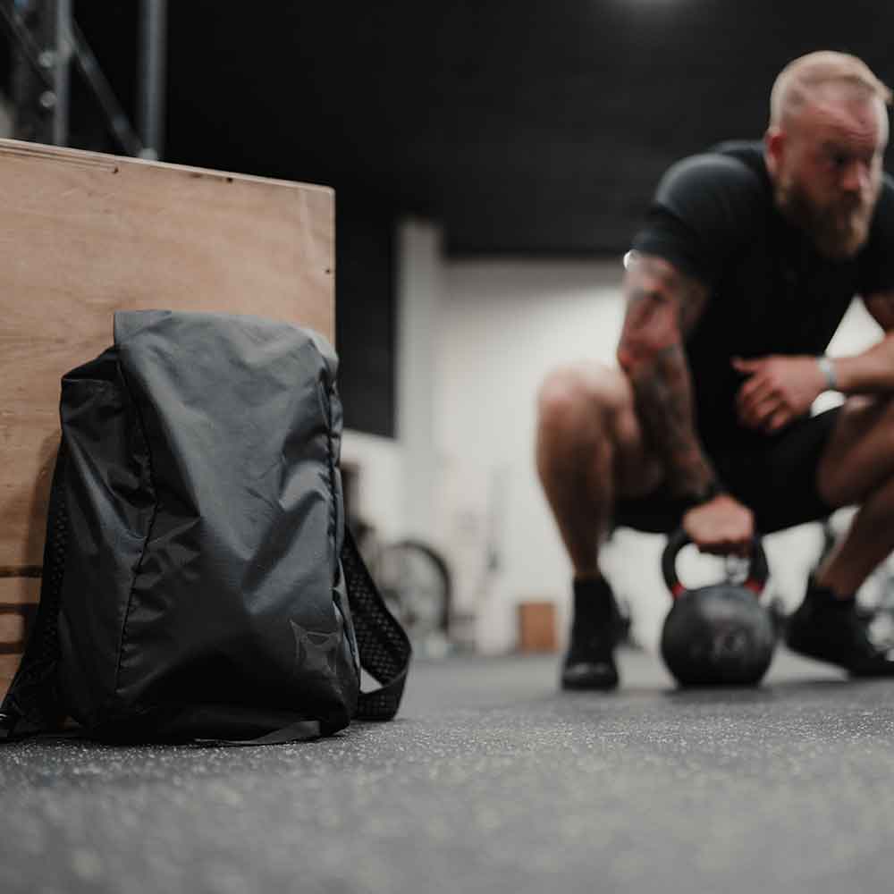 Vertx Go Pack Black Backpack in Use