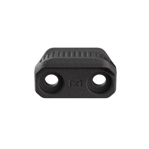 Magpul M-LOK Thumb Shelf Black detail view with ribbed curved thumb surface